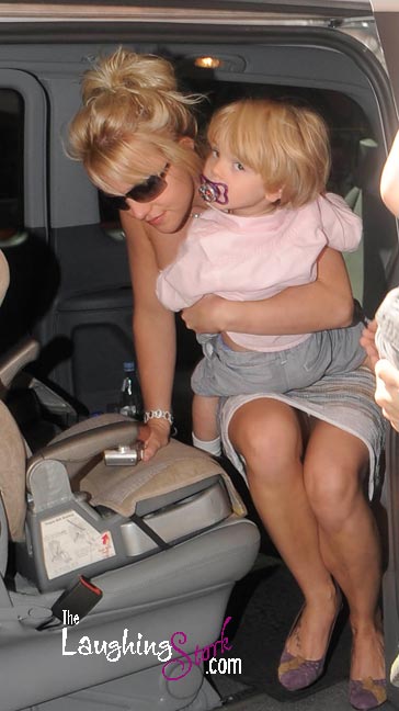 Britney Spears, now touring overseas, leaving her London hotel with son Jayden, 2,